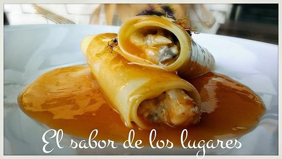 Canelones rellenos de setas y langostinos en salsa de marisco
