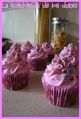 Al rico cupcake de algodón de azúcar y chocolate