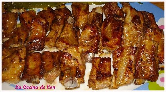 Costillas de cerdo adobadas fritas