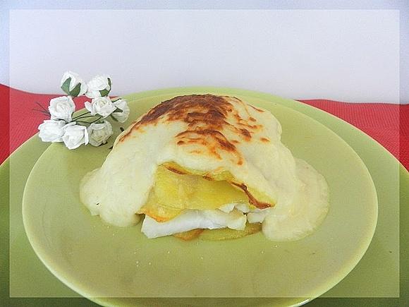 Timbal de patata y bacalao gratinado