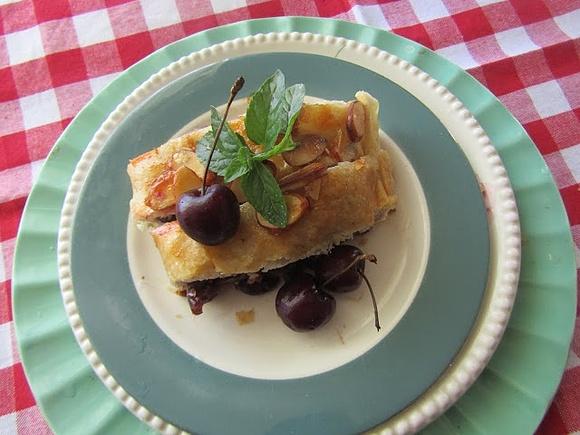 Apples and cherry strudel in puff pastry