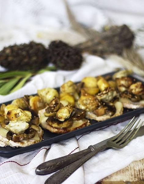 Filetes de lomo a la naranja con setas y alcachofas salteadas