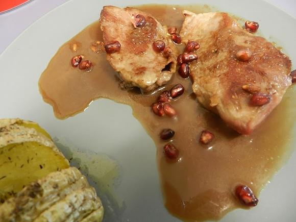 Presa de cerdo con salsa de granada
